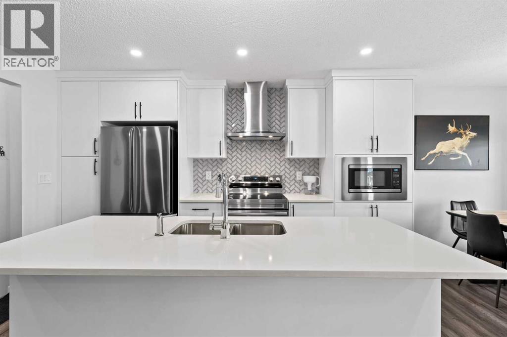 Photo 10 of 5006 Windsong Boulevard Sw, Airdrie AB