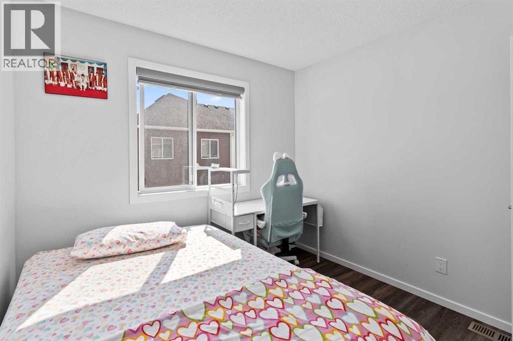 Photo 28 of 5006 Windsong Boulevard Sw, Airdrie AB