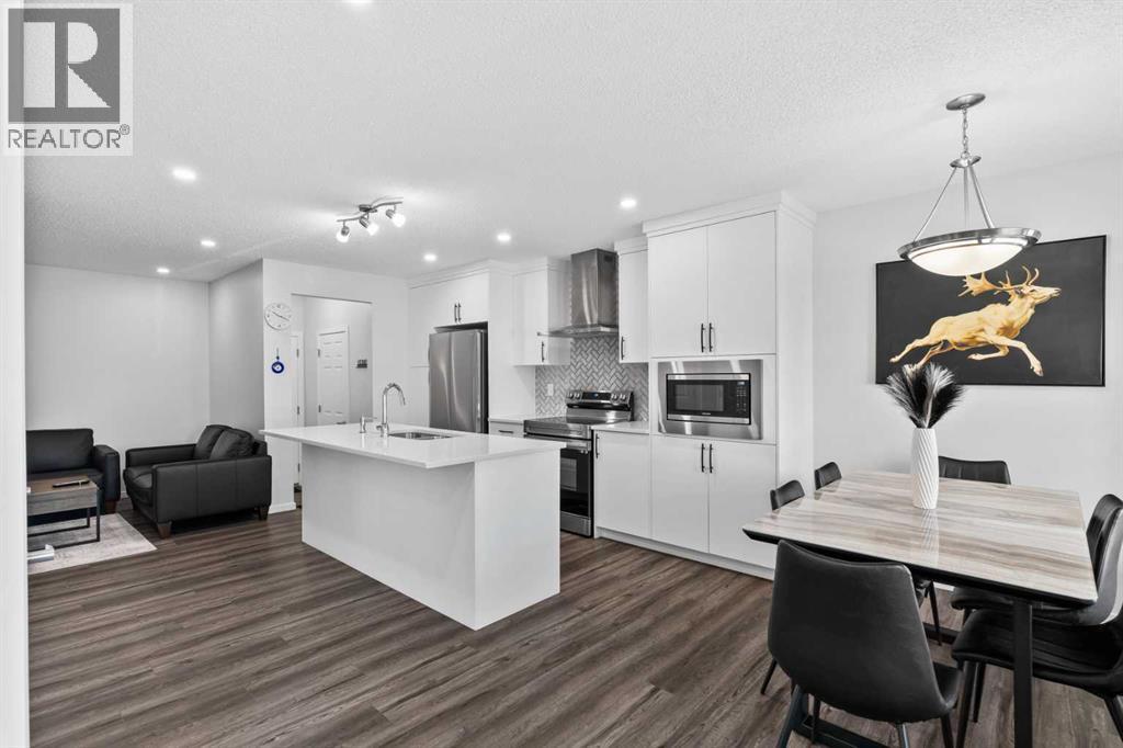 Photo 5 of 5006 Windsong Boulevard Sw, Airdrie AB