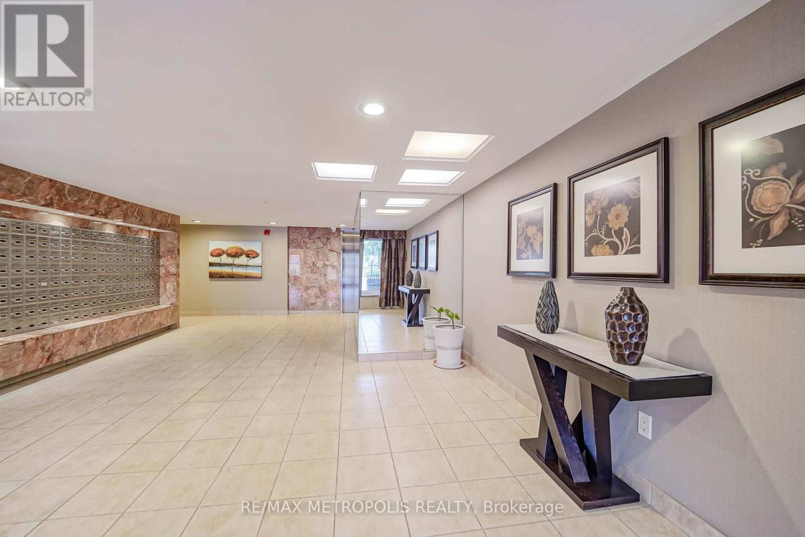 Photo 5 of 302 3131 Bridletown Circle, Toronto ON