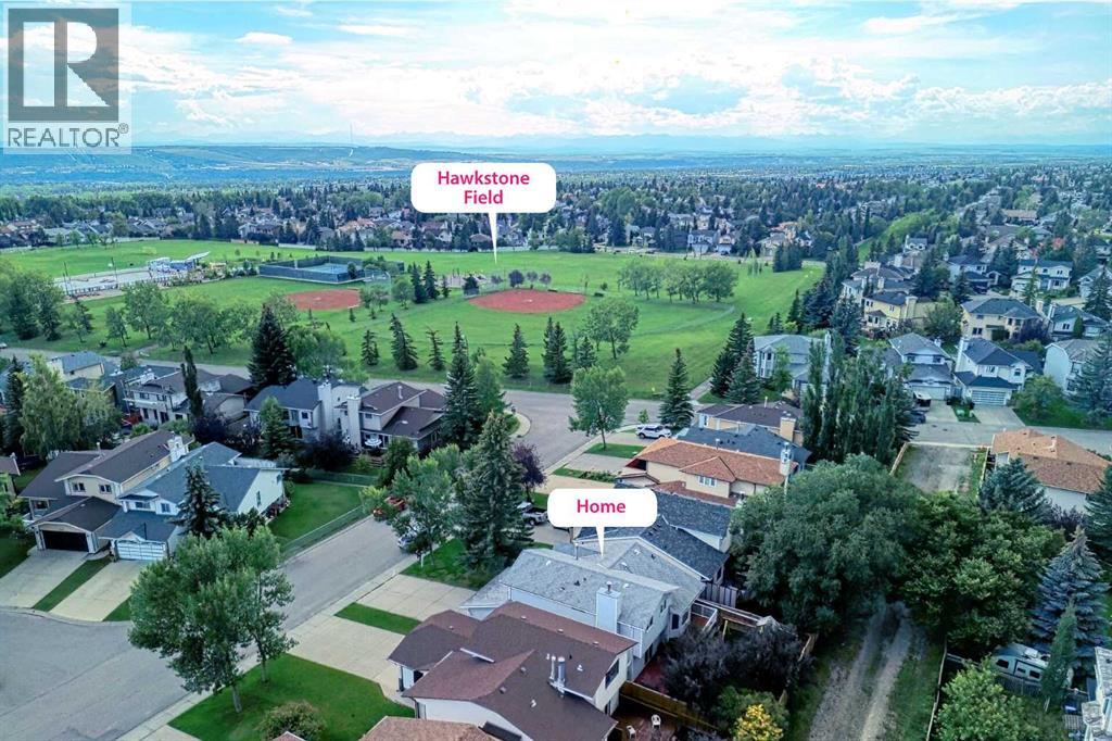 Single Family House 4 Level for Sale in  Hawkhill Place NW Hawkwood Calgary 