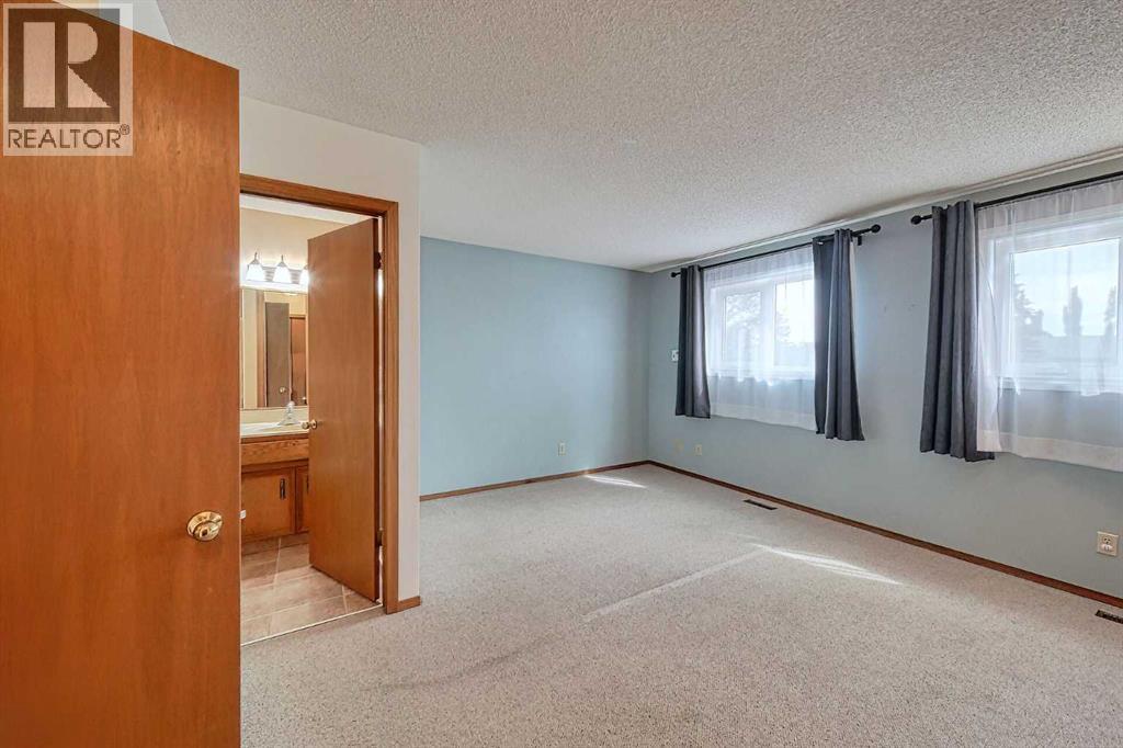 Single Family House 4 Level for Sale in  Hawkhill Place NW Hawkwood Calgary 