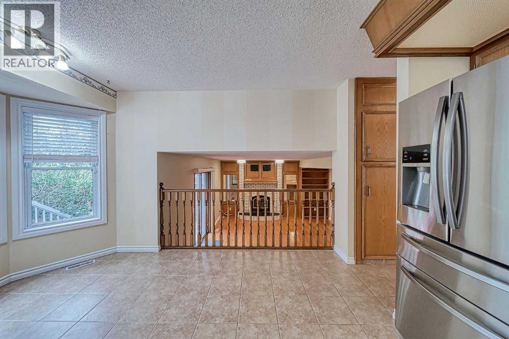 Single Family House 4 Level for Sale in  Hawkhill Place NW Hawkwood Calgary 