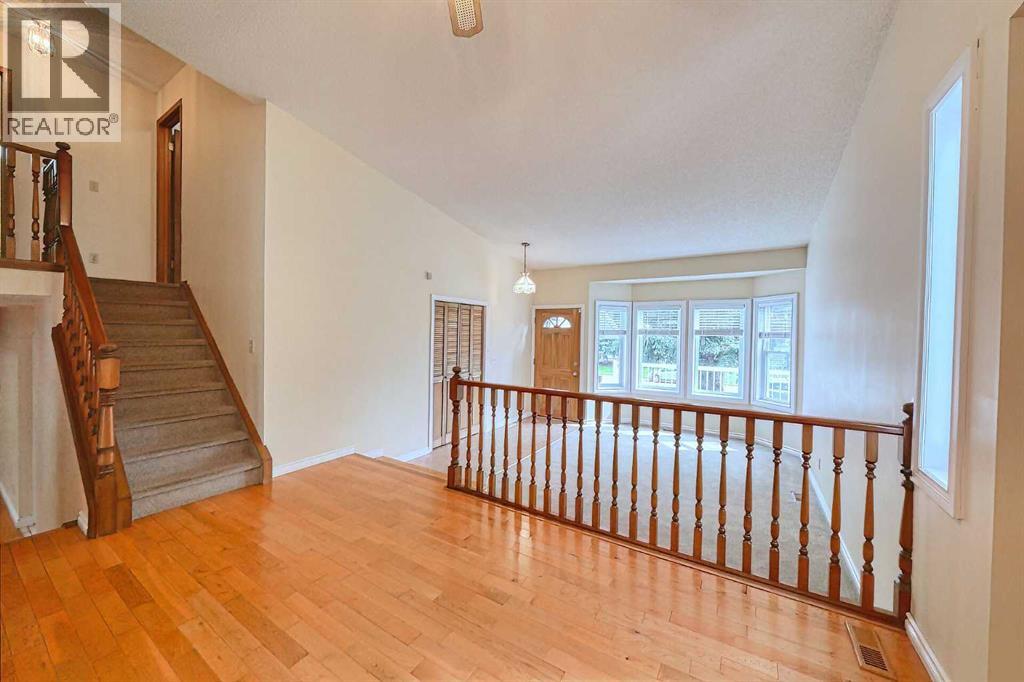 Single Family House 4 Level for Sale in  Hawkhill Place NW Hawkwood Calgary 
