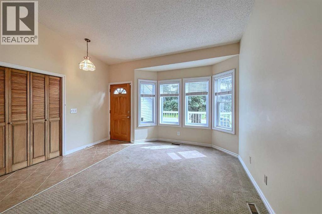 Single Family House 4 Level for Sale in  Hawkhill Place NW Hawkwood Calgary 