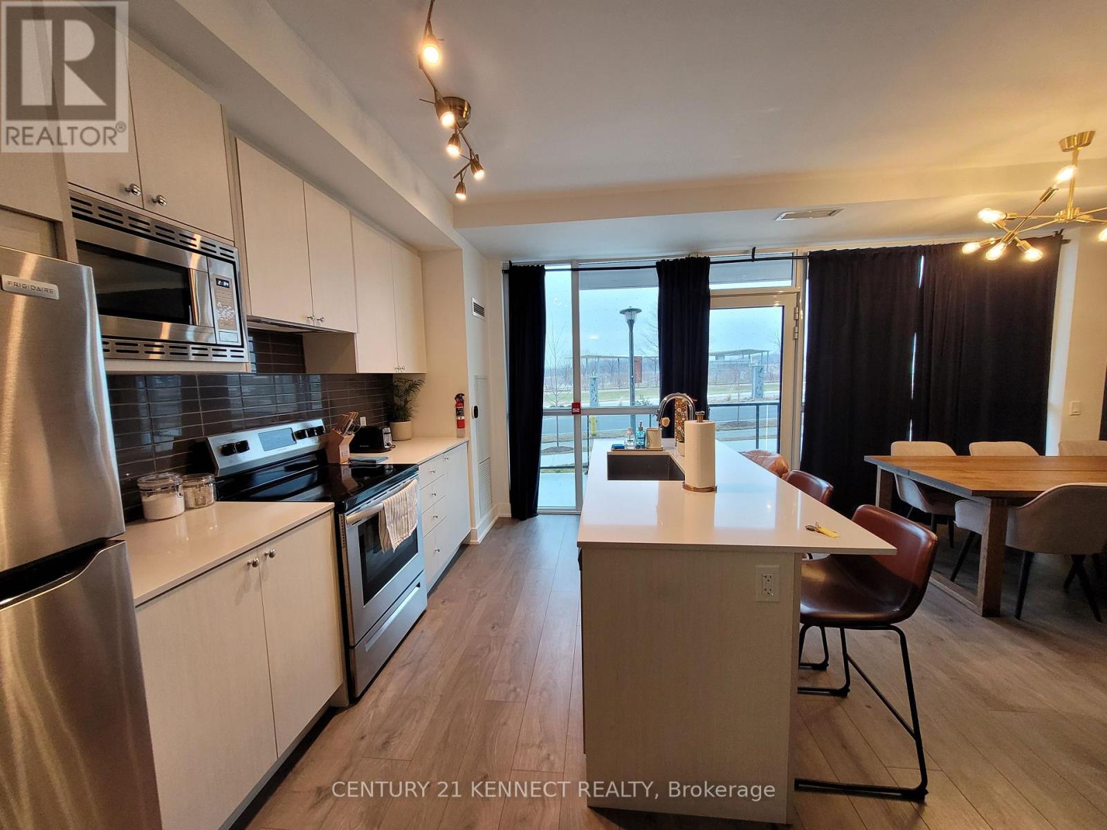 Photo 2 of Th 02 60 George Butchart Drive, Toronto ON