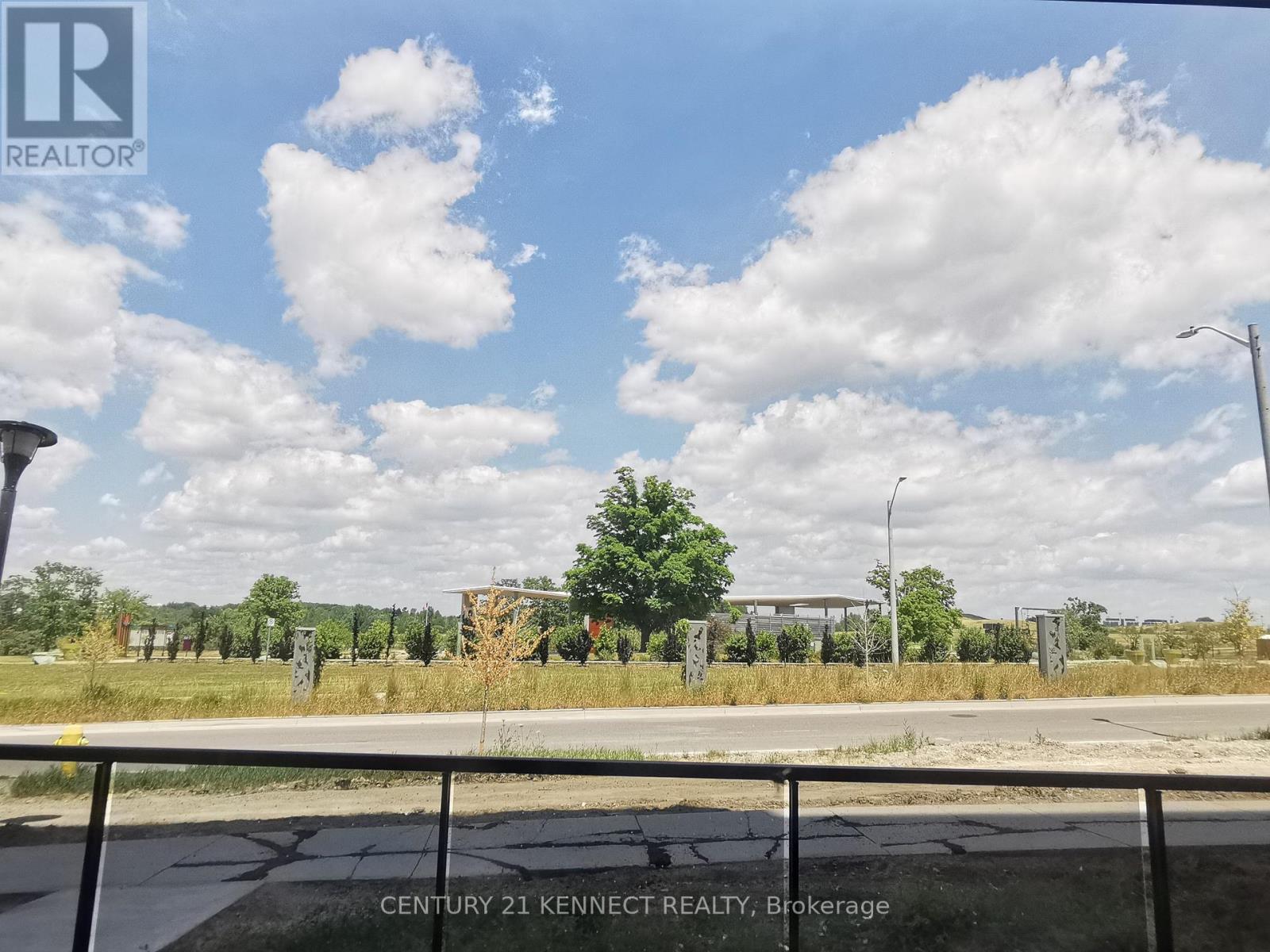 Photo 6 of Th 02 60 George Butchart Drive, Toronto ON