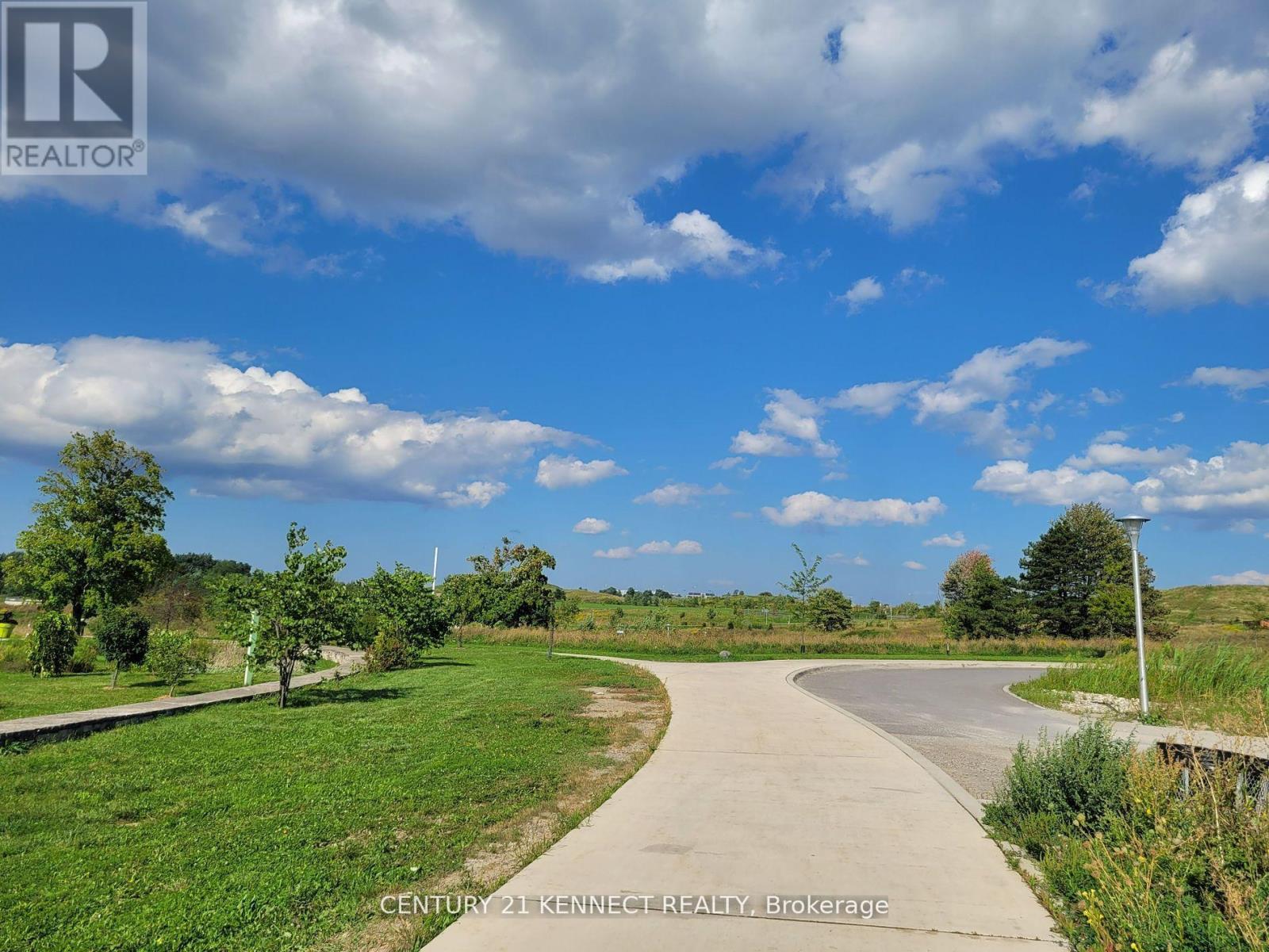 Photo 3 of Th 03 60 George Butchart Drive, Toronto ON