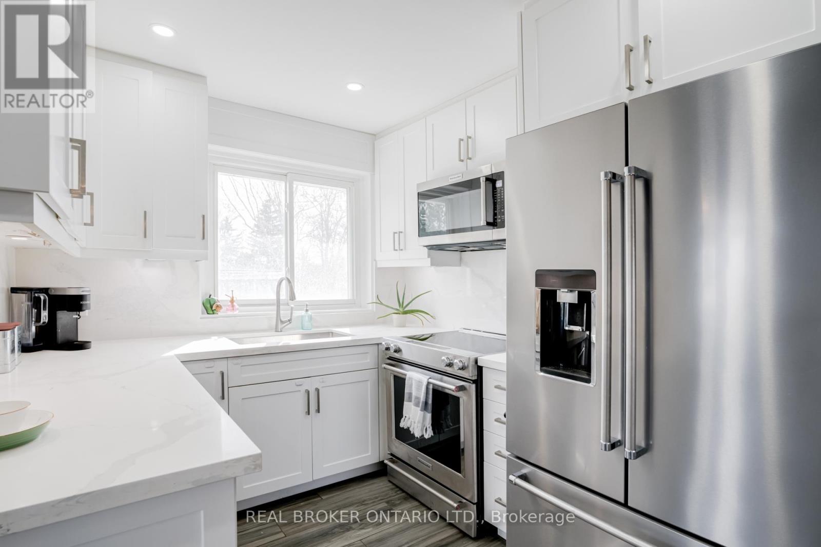 Photo 17 of 50 Epsom Downs Drive, Brampton ON