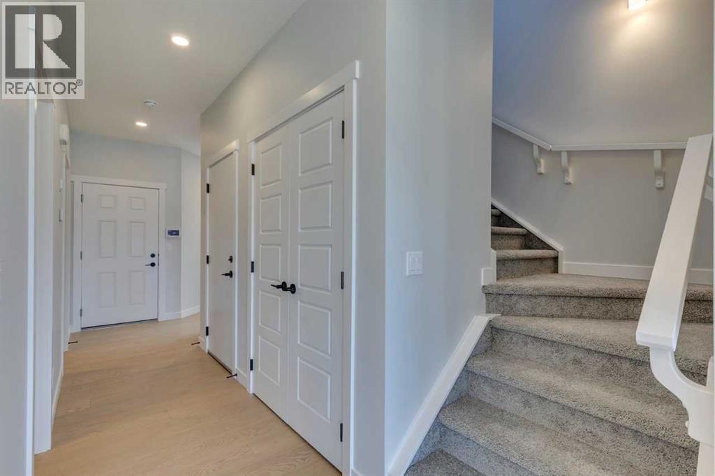 Photo 11 of 126 Belmont Passage Sw, Calgary AB