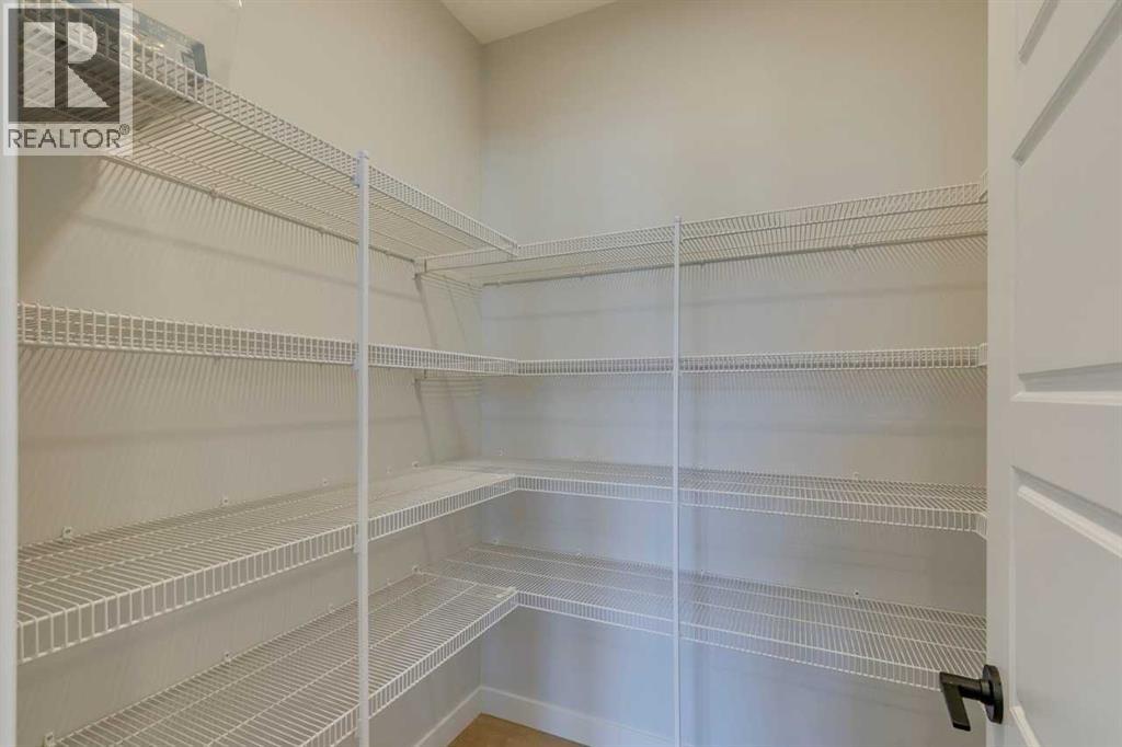 Photo 17 of 126 Belmont Passage Sw, Calgary AB
