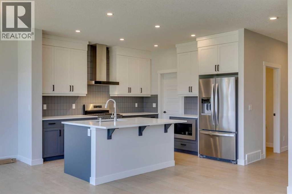 Photo 23 of 126 Belmont Passage Sw, Calgary AB