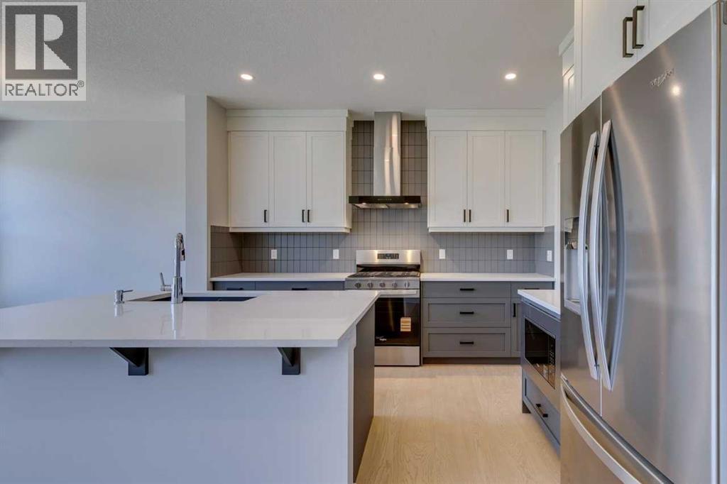 Photo 12 of 126 Belmont Passage Sw, Calgary AB