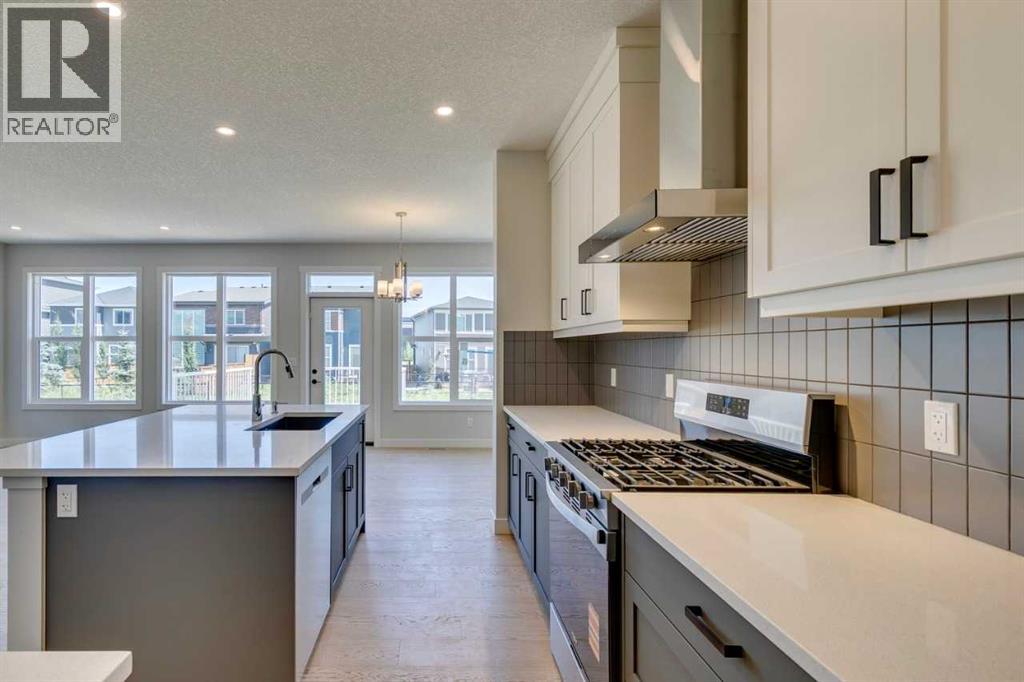 Photo 16 of 126 Belmont Passage Sw, Calgary AB