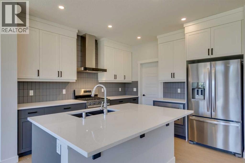 Photo 14 of 126 Belmont Passage Sw, Calgary AB
