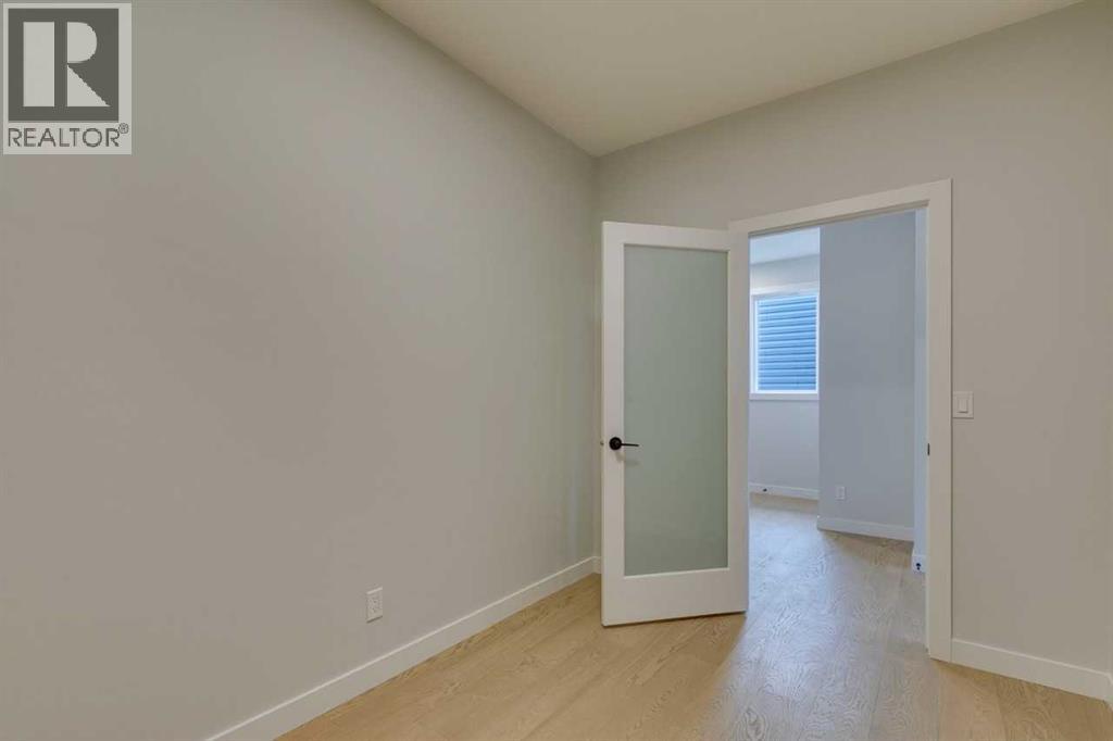 Photo 9 of 126 Belmont Passage Sw, Calgary AB