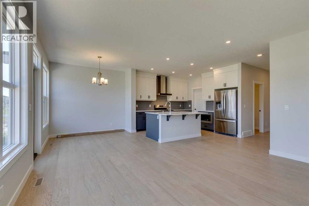 Photo 22 of 126 Belmont Passage Sw, Calgary AB