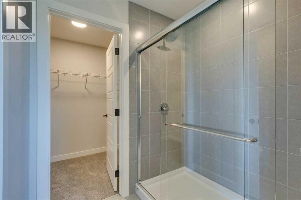 Photo 40 of 126 Belmont Passage Sw, Calgary AB