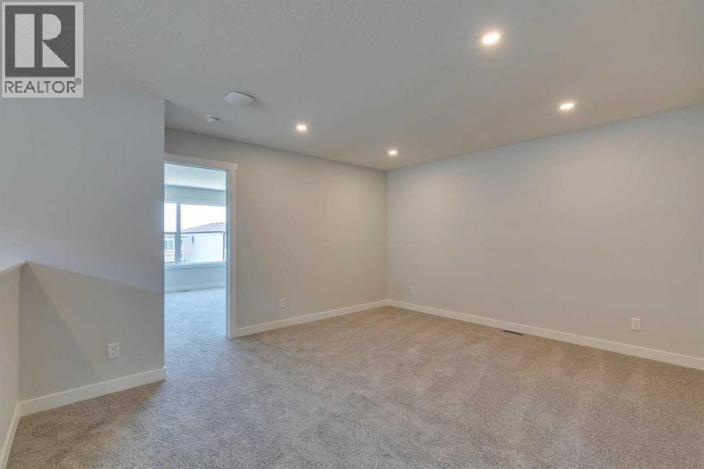 Photo 26 of 126 Belmont Passage Sw, Calgary AB