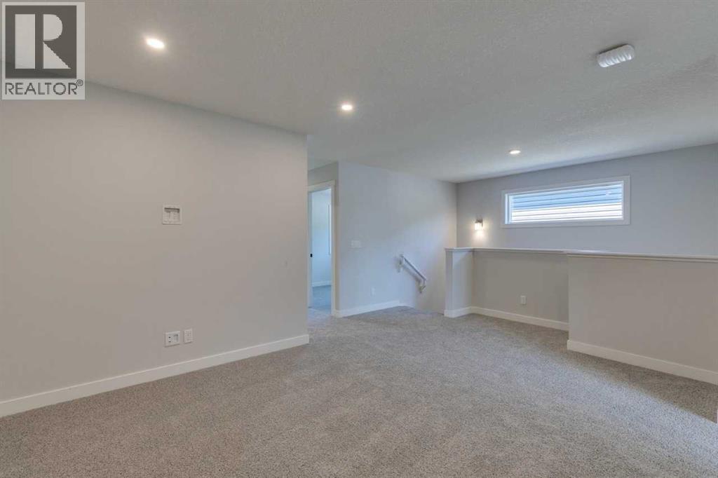 Photo 28 of 126 Belmont Passage Sw, Calgary AB