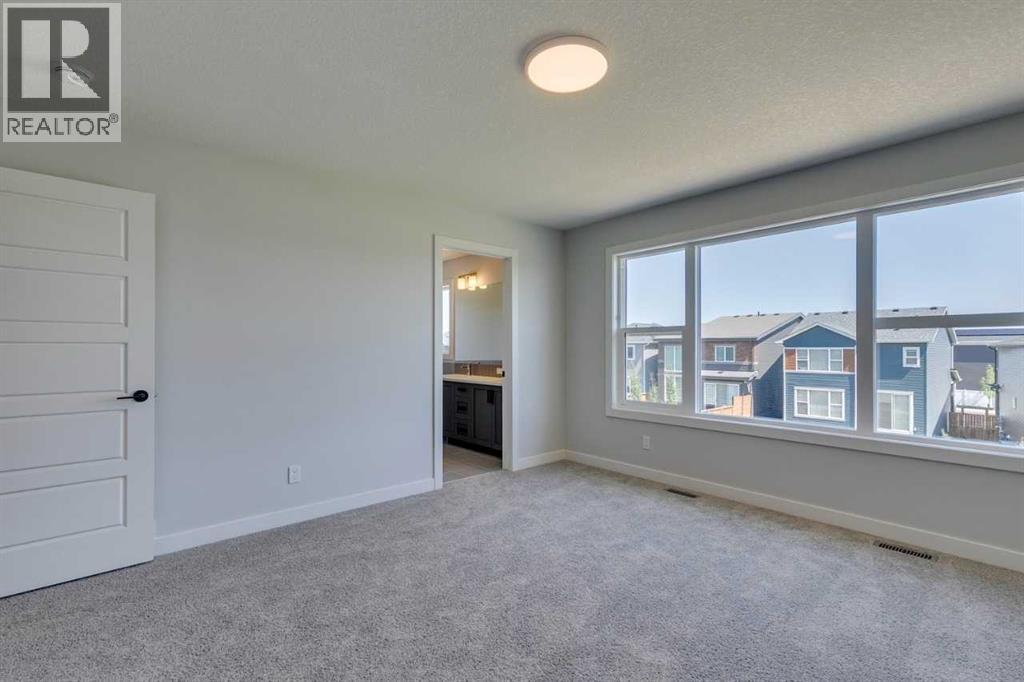 Photo 35 of 126 Belmont Passage Sw, Calgary AB