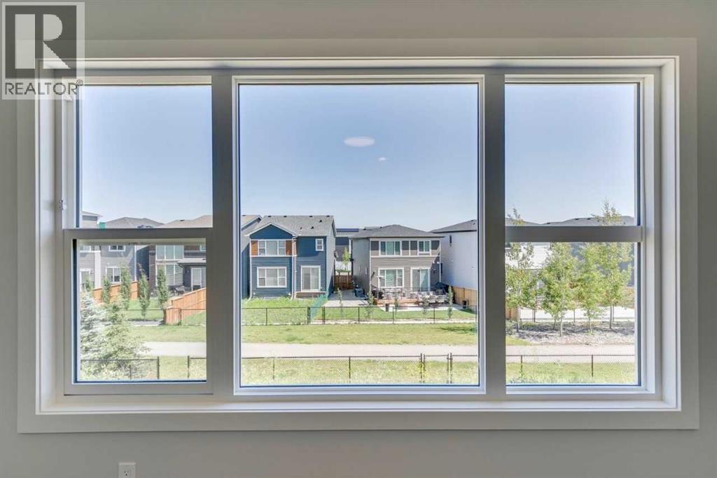 Photo 42 of 126 Belmont Passage Sw, Calgary AB