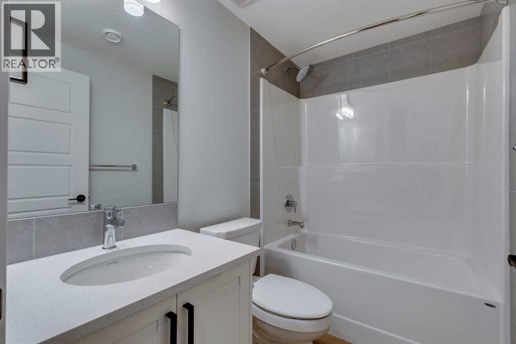 Photo 47 of 126 Belmont Passage Sw, Calgary AB