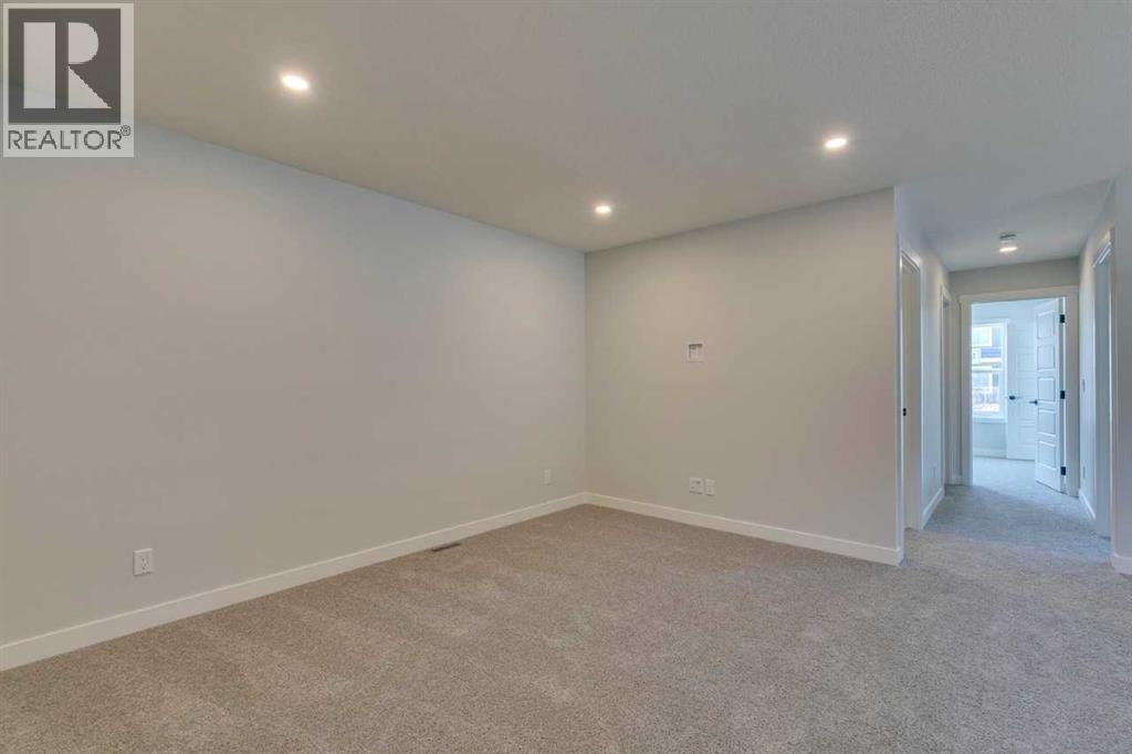 Photo 27 of 126 Belmont Passage Sw, Calgary AB