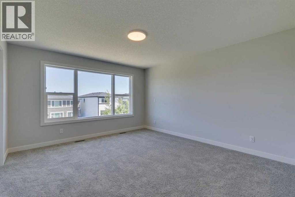 Photo 34 of 126 Belmont Passage Sw, Calgary AB