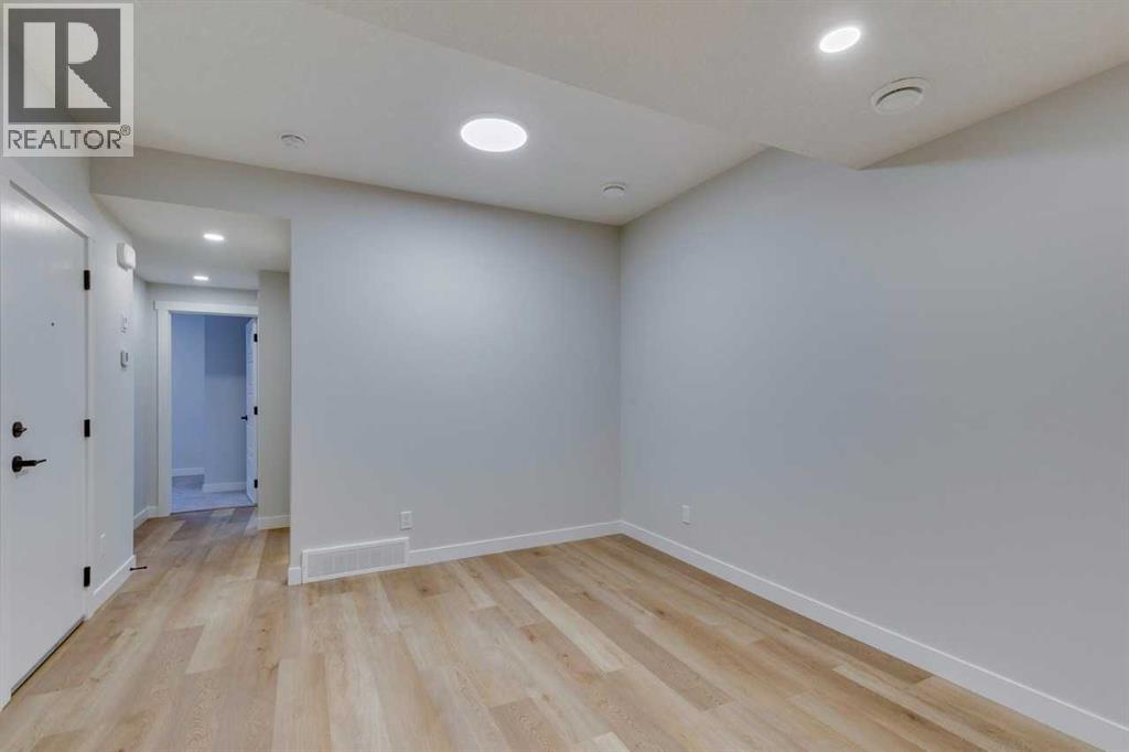 Photo 46 of 126 Belmont Passage Sw, Calgary AB