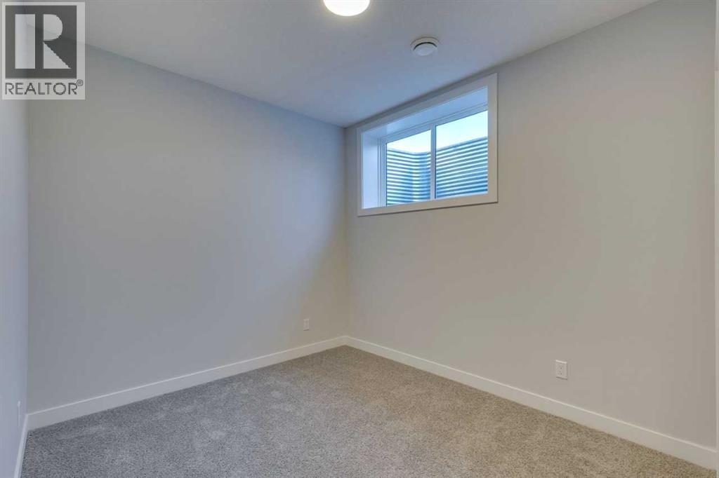 Photo 49 of 126 Belmont Passage Sw, Calgary AB