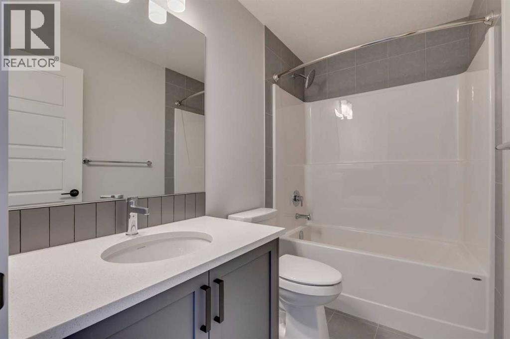 Photo 31 of 126 Belmont Passage Sw, Calgary AB