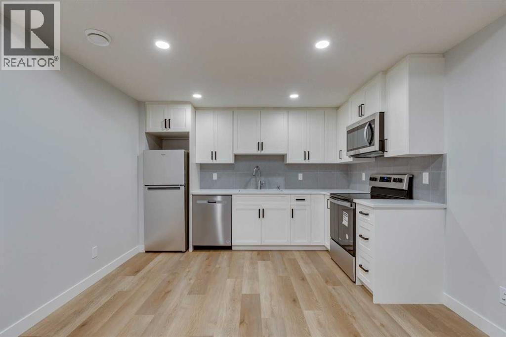 Photo 44 of 126 Belmont Passage Sw, Calgary AB