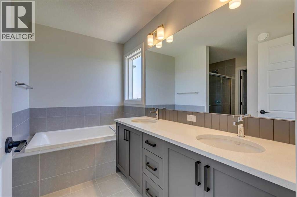 Photo 37 of 126 Belmont Passage Sw, Calgary AB