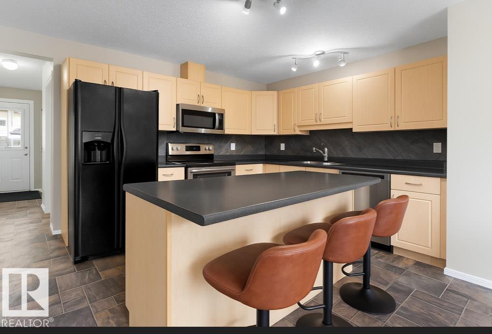 Photo 3 of 7831 8 Av Sw, Edmonton AB