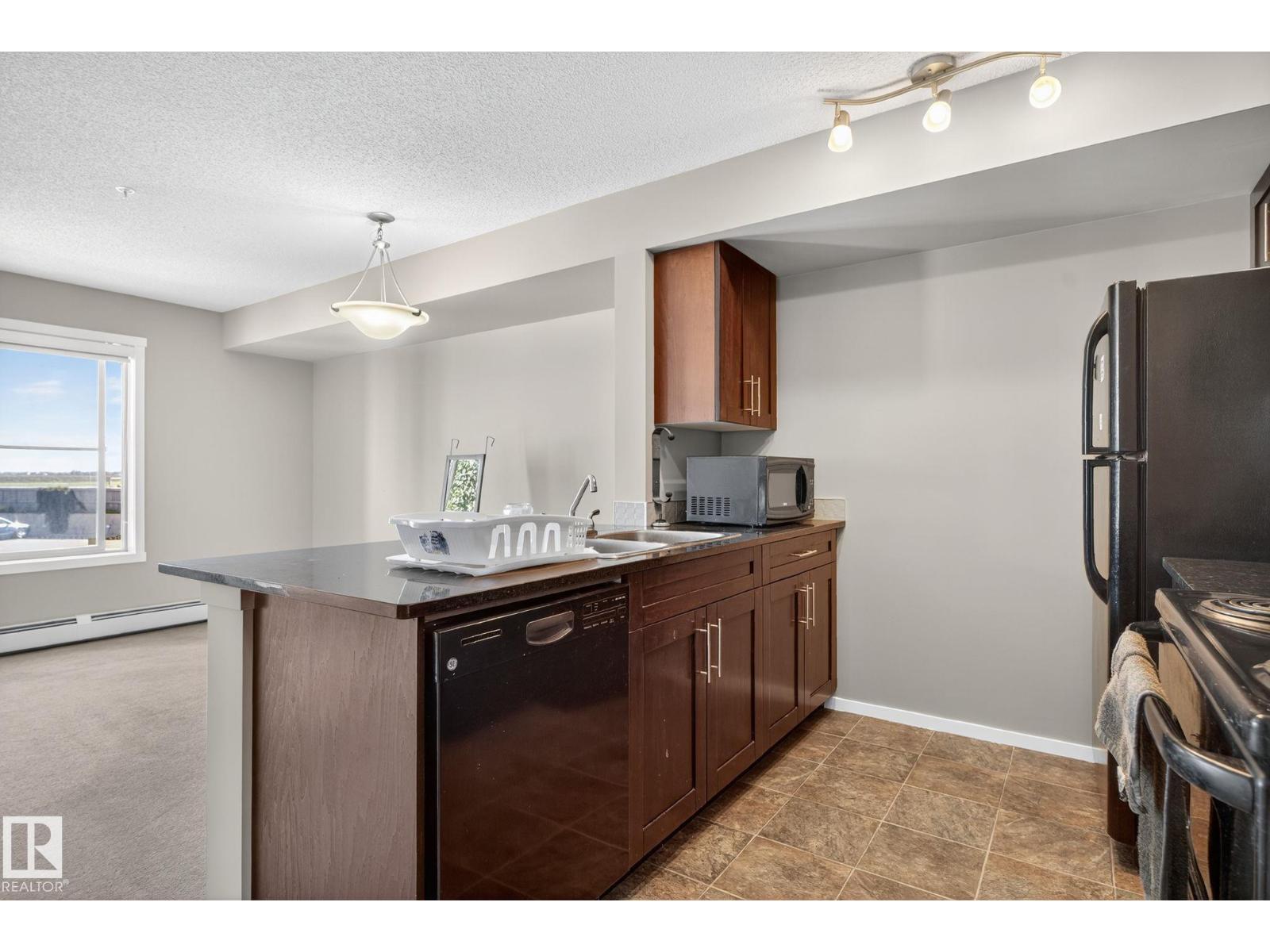 Photo 12 of 208 5810 Mullen Pl Nw, Edmonton AB