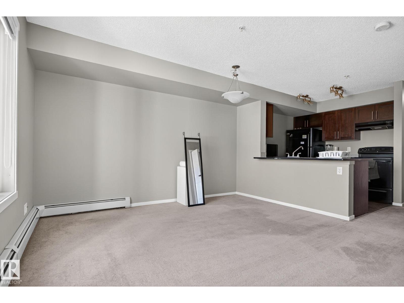 Photo 11 of 208 5810 Mullen Pl Nw, Edmonton AB
