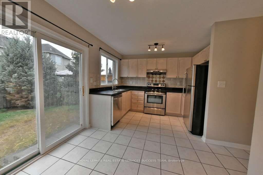 Photo 2 of 1652 Beaty Trail, Milton ON
