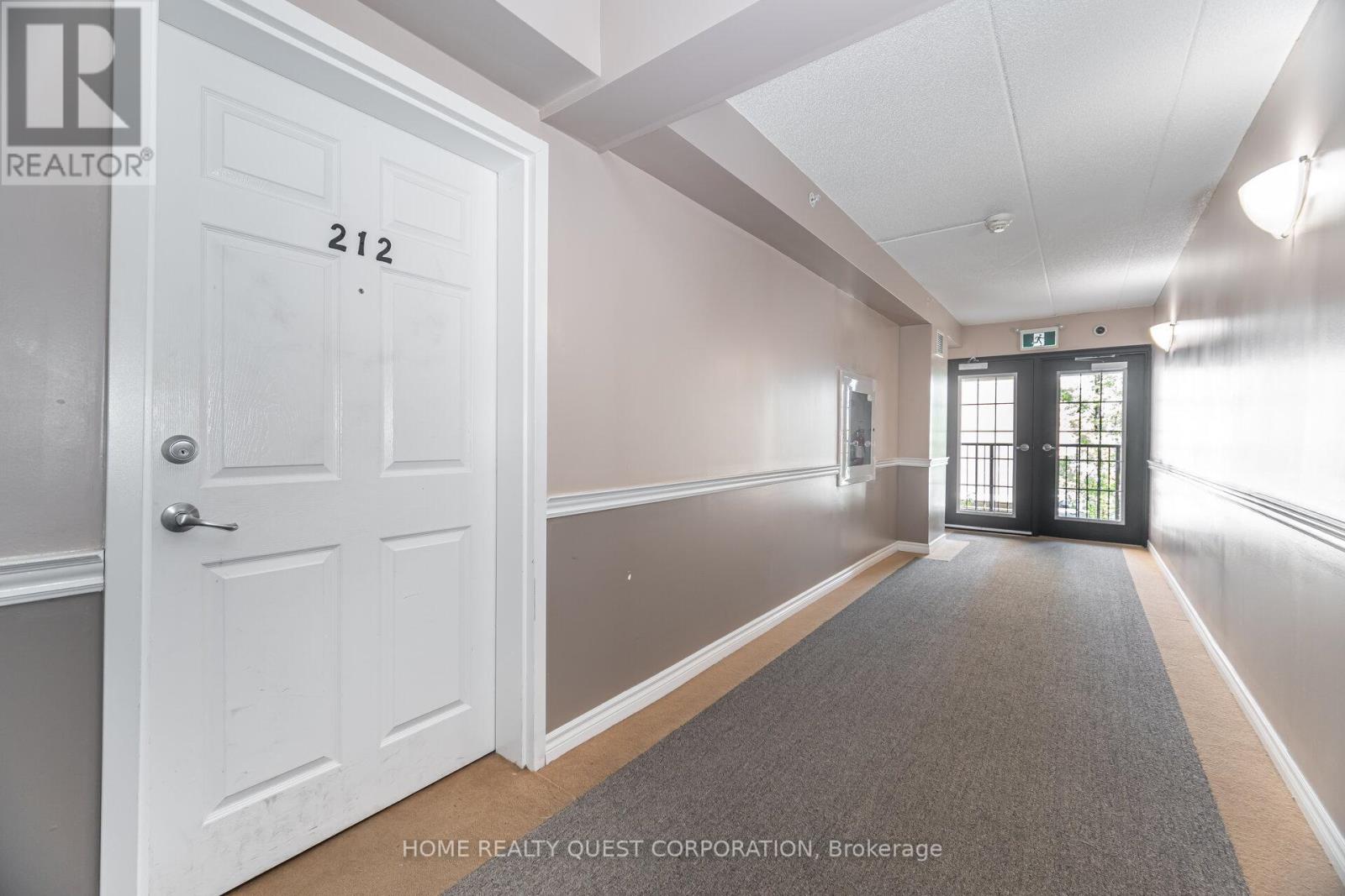 Photo 2 of 212 1340 Main Street E, Milton ON