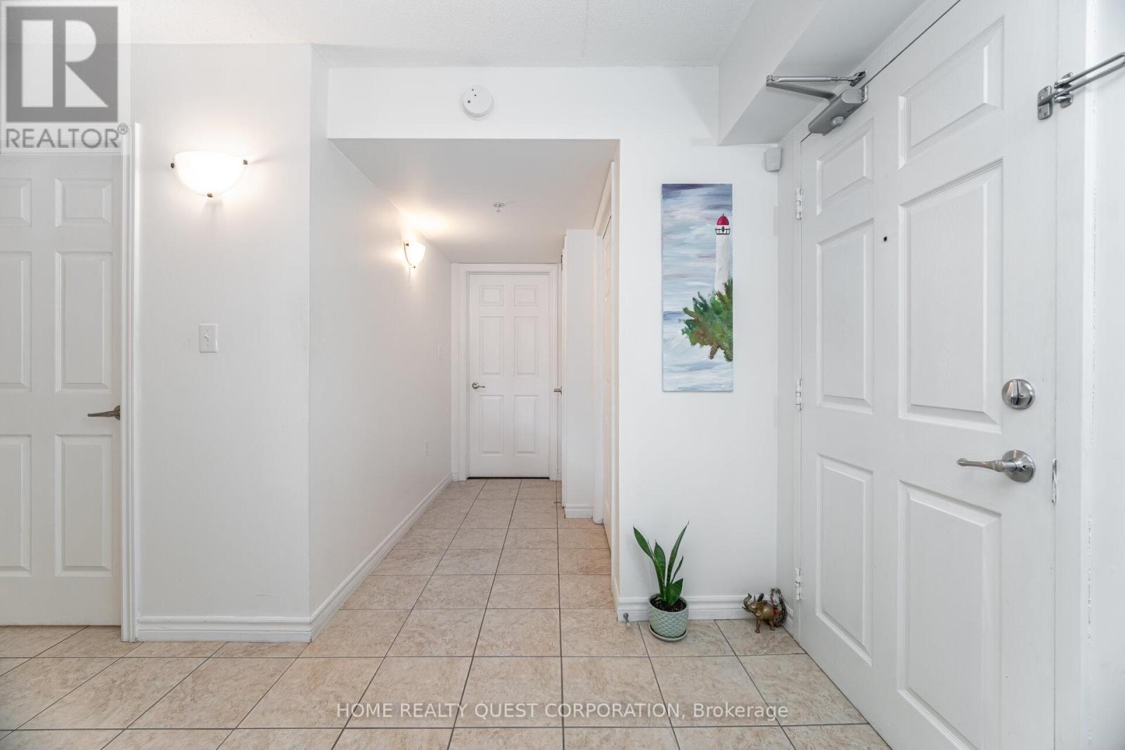 Photo 4 of 212 1340 Main Street E, Milton ON