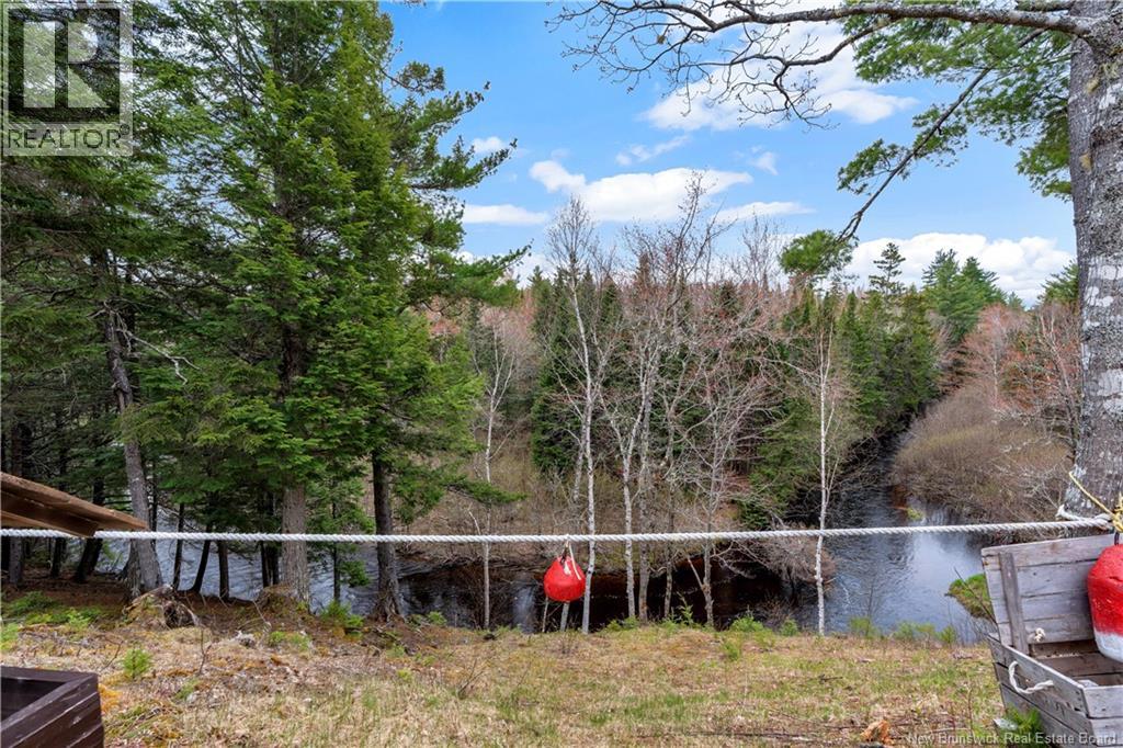 Photo 16 of Camp Tweedie Brook Road, Kouchibouguac NB