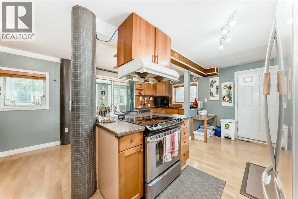 Single Family House 4 Level for Sale in  Bow Crescent NW Bowness Calgary 