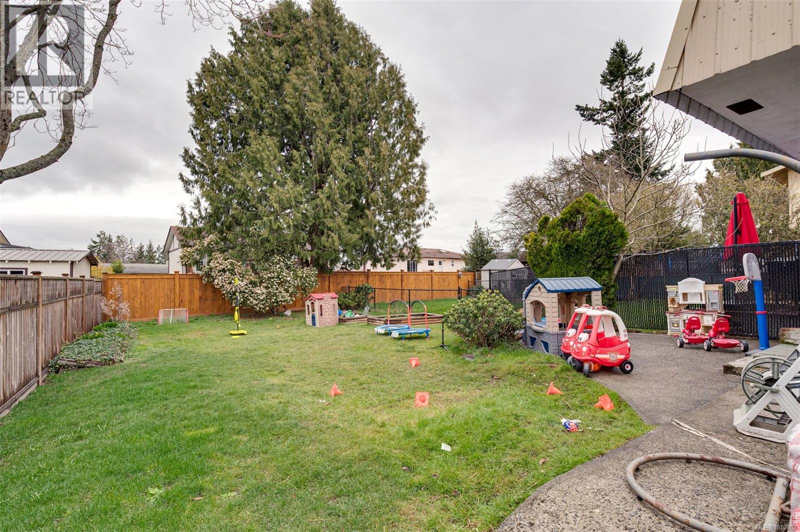 Photo 2 of 2031 2033 Melville Dr, Sidney BC