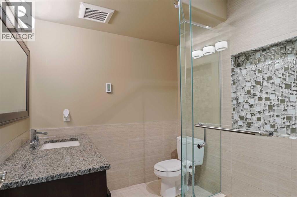 Photo 3 of 117 Rockcliff Bay Nw, Calgary AB