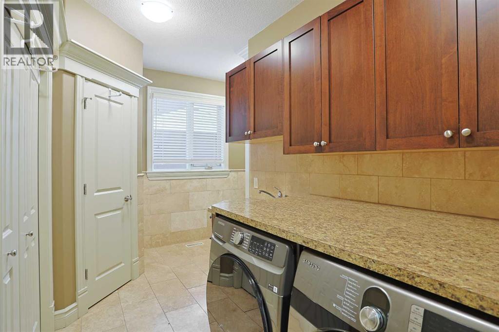 Photo 23 of 117 Rockcliff Bay Nw, Calgary AB