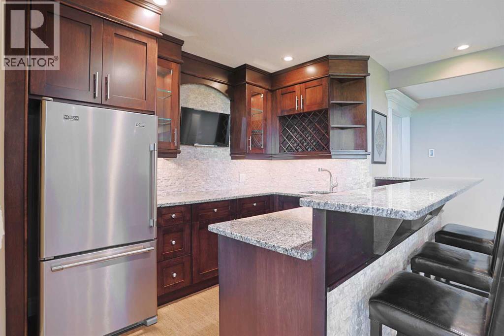 Photo 44 of 117 Rockcliff Bay Nw, Calgary AB