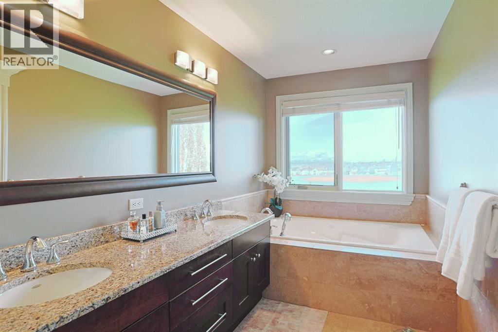 Photo 20 of 117 Rockcliff Bay Nw, Calgary AB