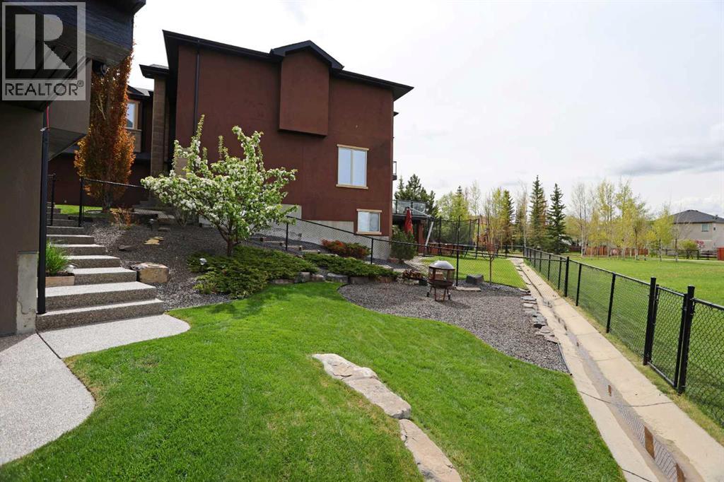 Photo 1 of 117 Rockcliff Bay Nw, Calgary AB