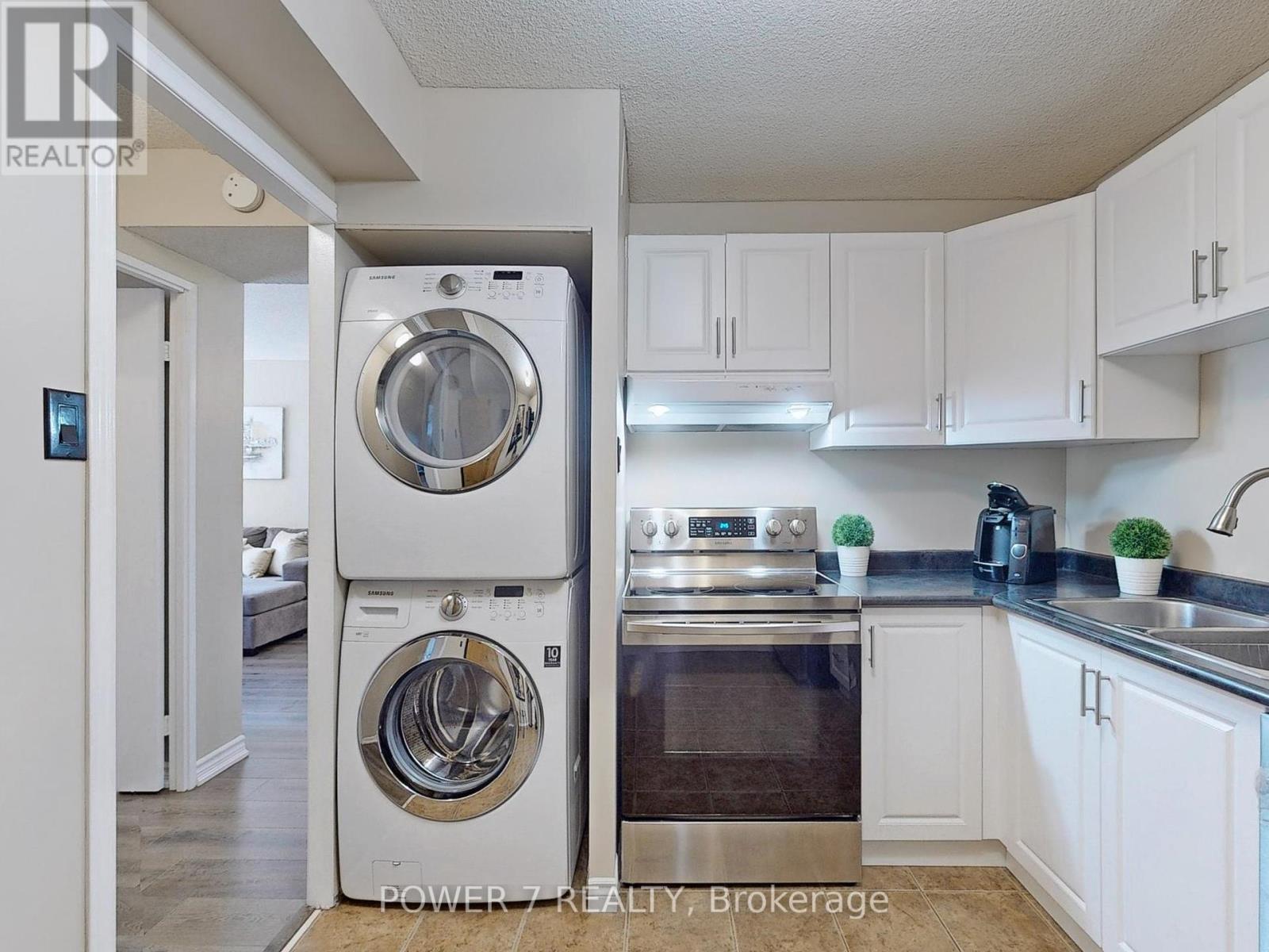 Photo 8 of 407 10 Tangreen Court, Toronto ON