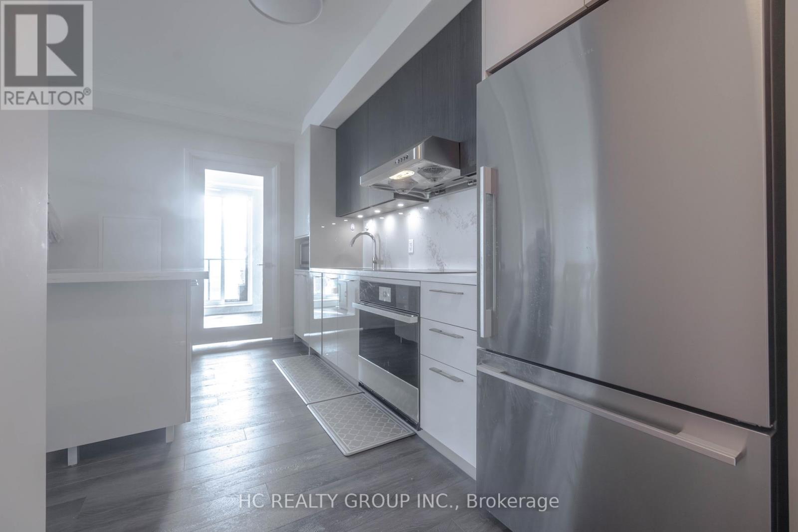 Photo 4 of 2710 8 Water Walk Drive, Markham ON